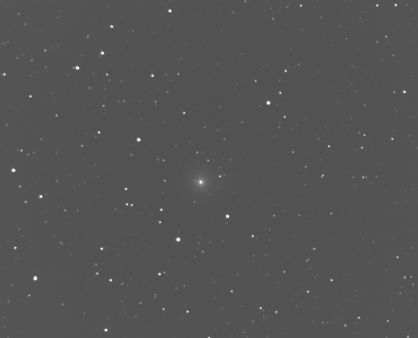 Comet through telescope
