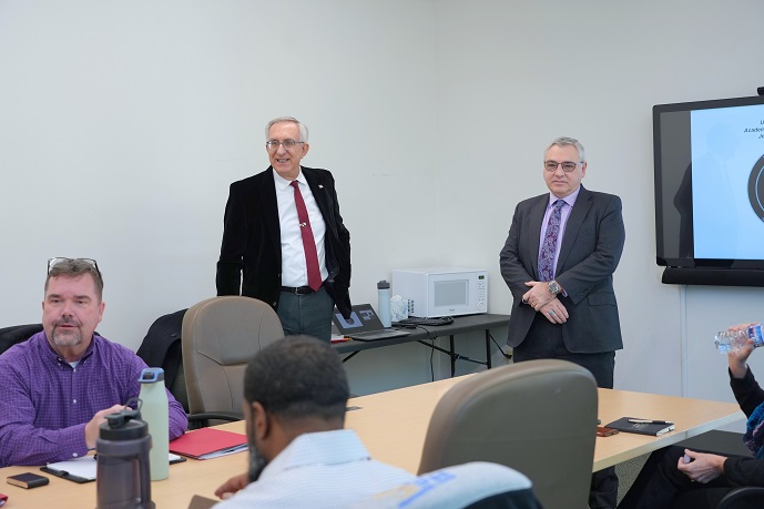 Dr. Sims and Jeff Volosin Greet USSPACECOM