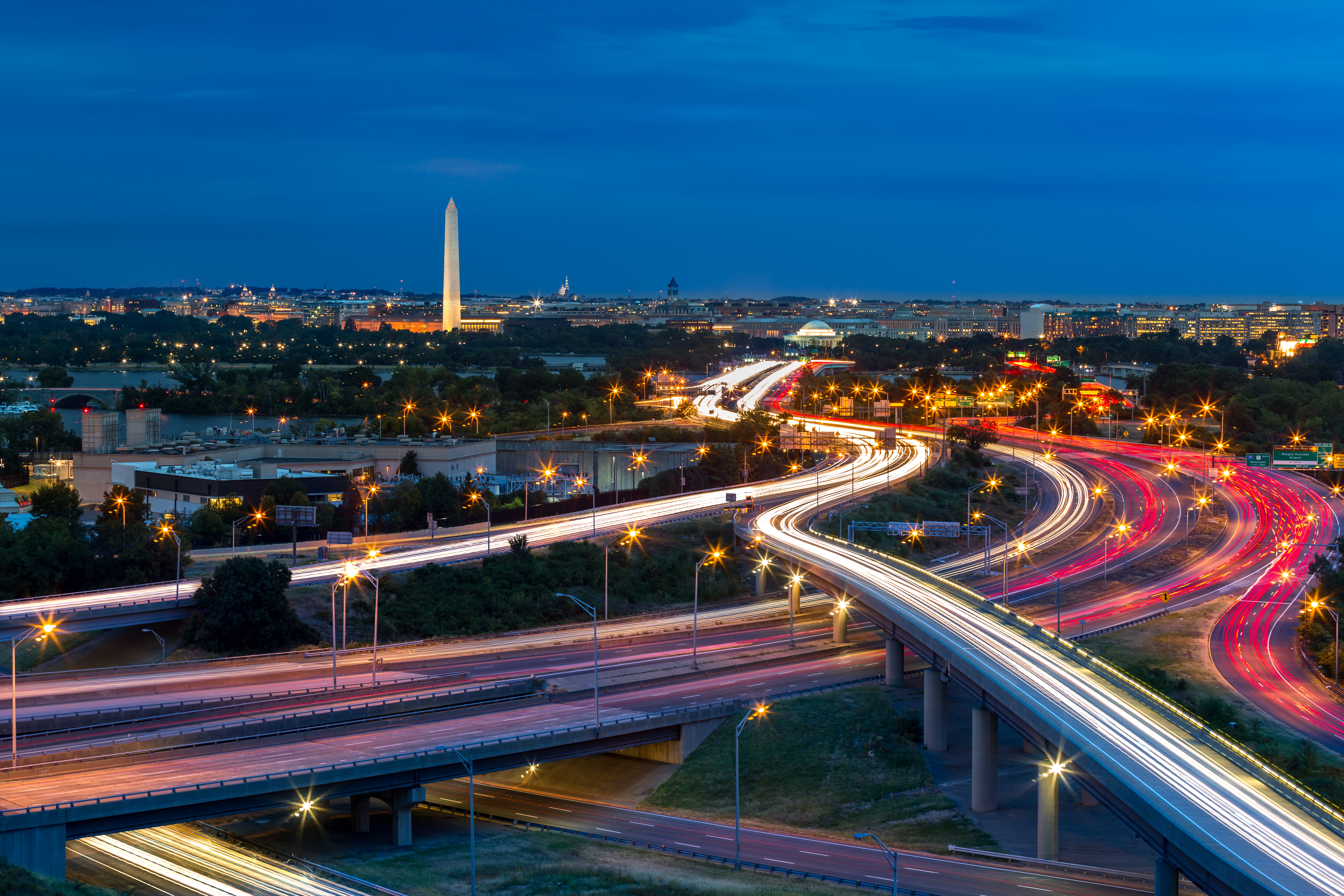 A photograph of the Washington D.C belt way at night. 