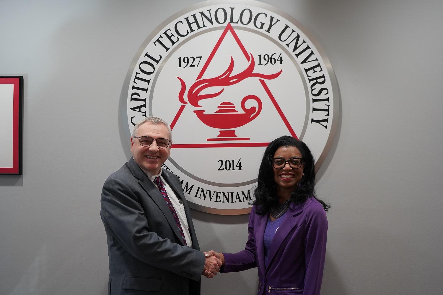 Capitol Tech President Bradford Sims and GAN Founder Elisa Basnight